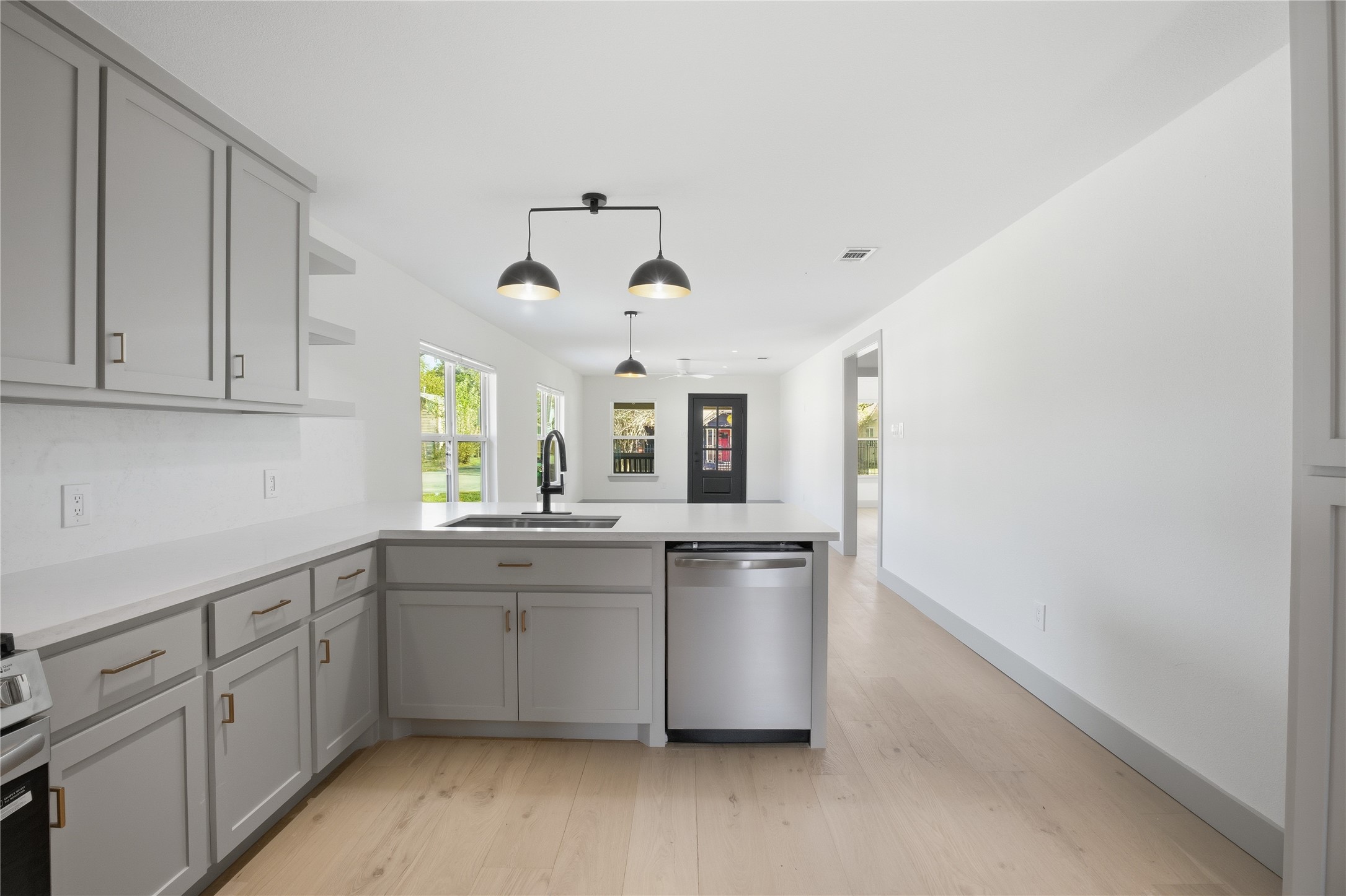 1415 Tabor Street Houston, TX 77009 - Photo 10 of 31 a kitchen with sink and cabinets
