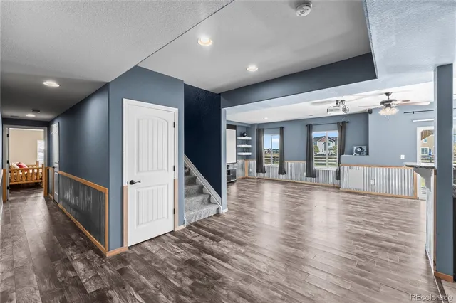 a view of livingroom with furniture and stairs