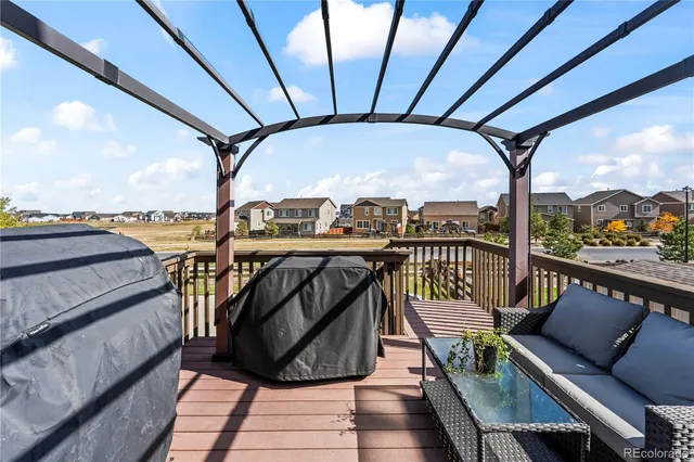 a view of a balcony with furniture