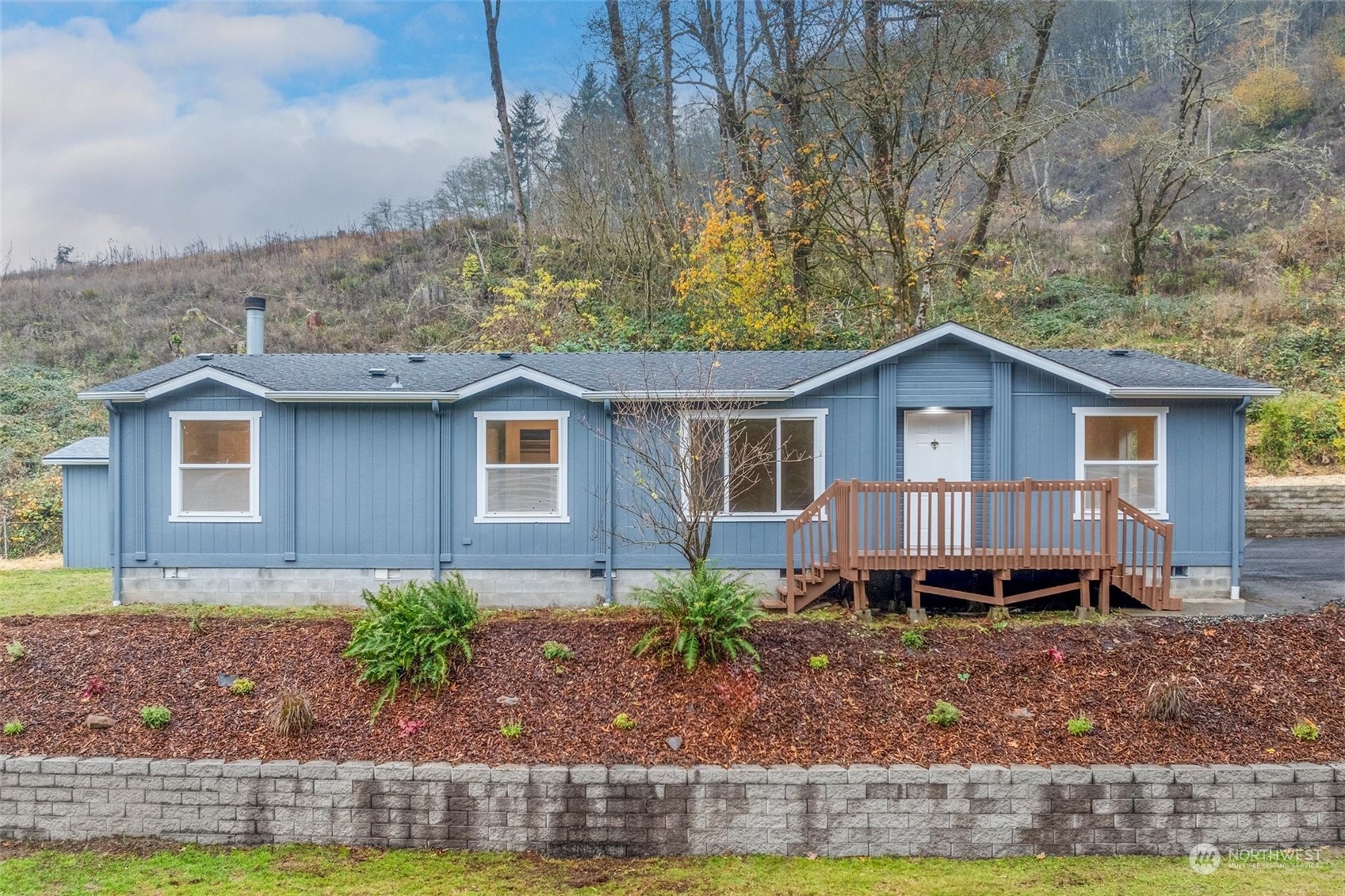 a front view of a house with garden