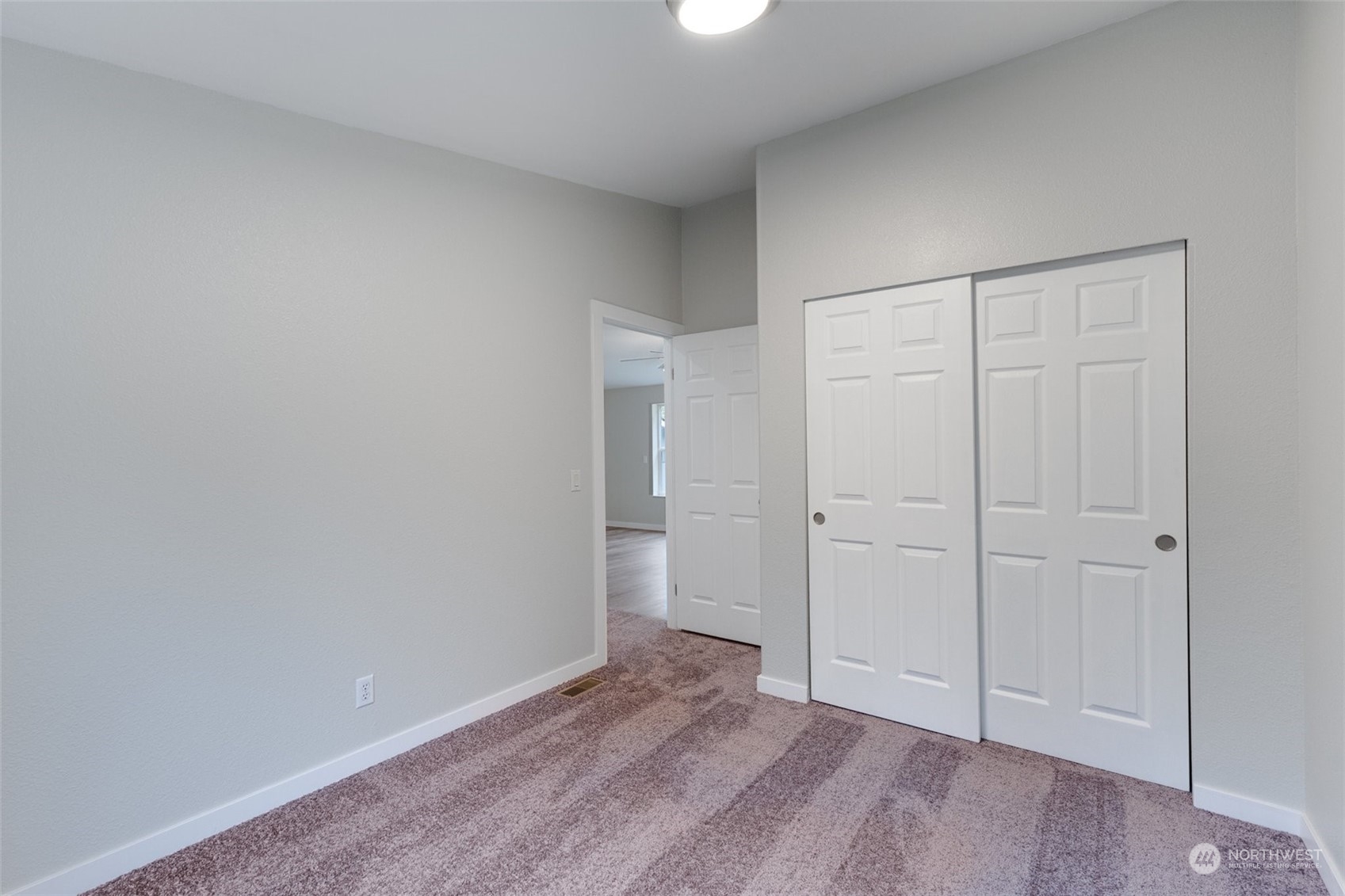 125 Hackett Road Longview, WA 98632 - Photo 14 of 34 a view of an empty room and wooden floor