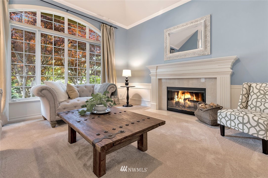 5010 176th Street Southeast Bothell, WA 98012 - Photo 11 of 25 a living room with furniture and a fireplace