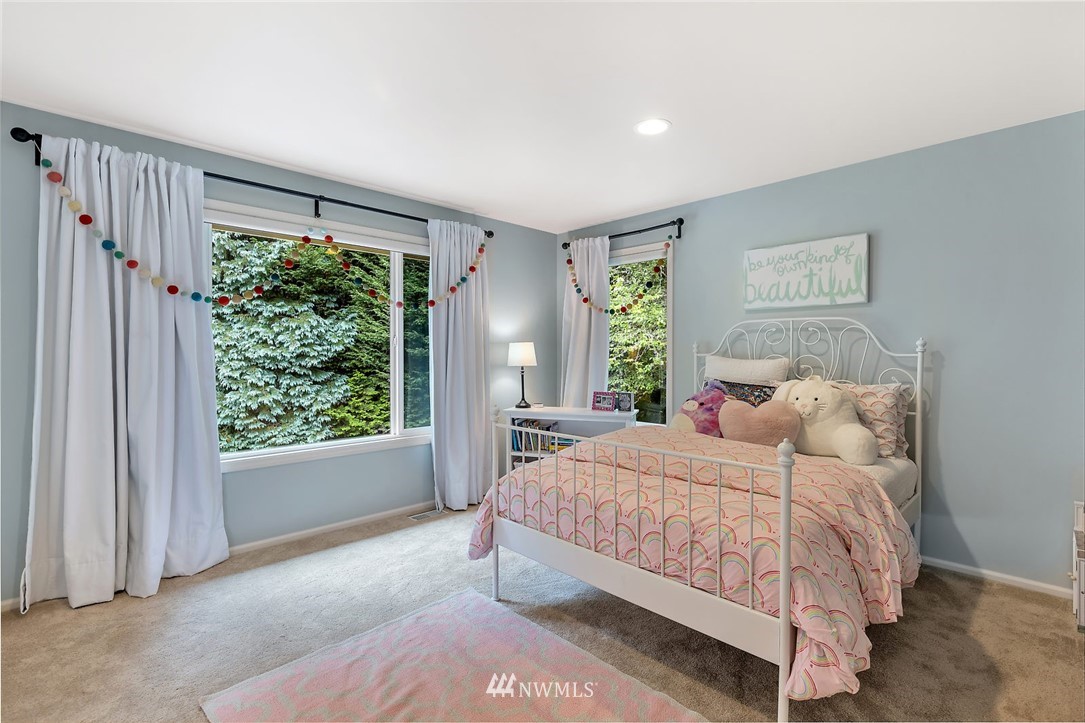 5010 176th Street Southeast Bothell, WA 98012 - Photo 16 of 25 a bedroom with a large bed and a window