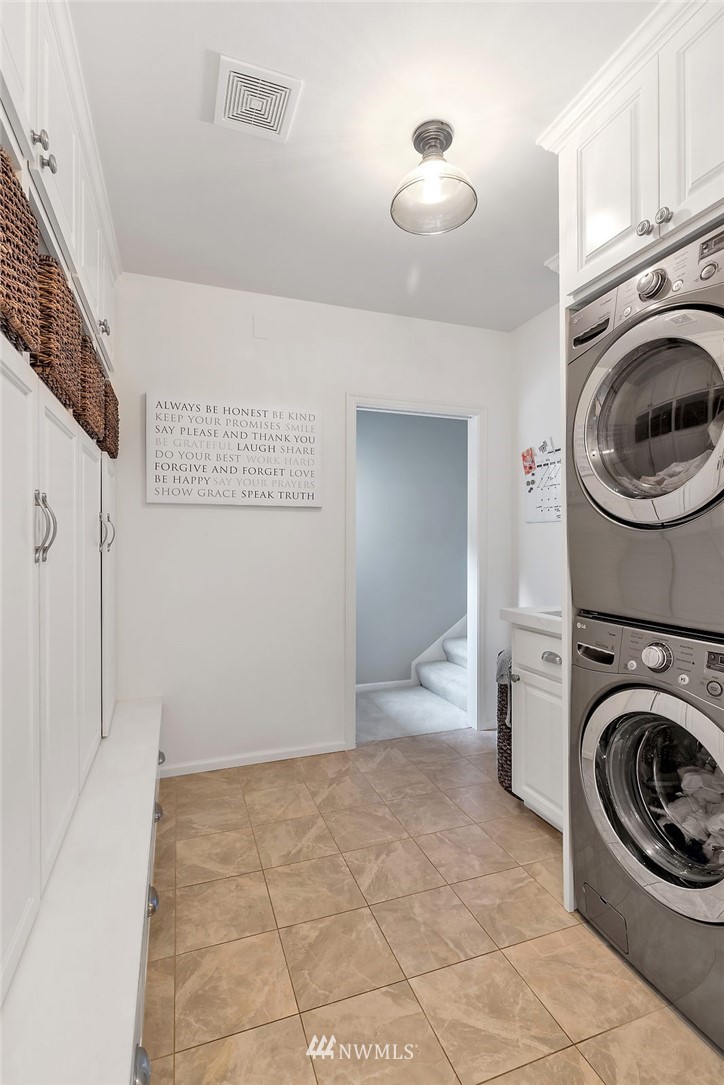 5010 176th Street Southeast Bothell, WA 98012 - Photo 22 of 25 a view of a storage & utility room with washer and dryer