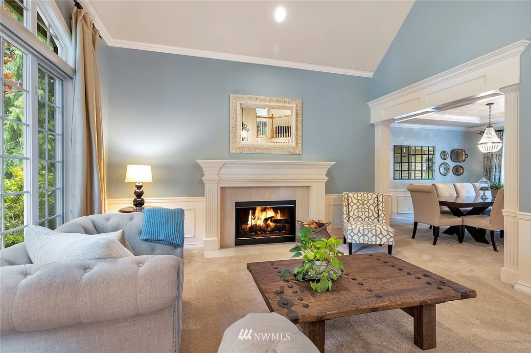 5010 176th Street Southeast Bothell, WA 98012 - Photo 5 of 25 a living room with furniture and a fireplace