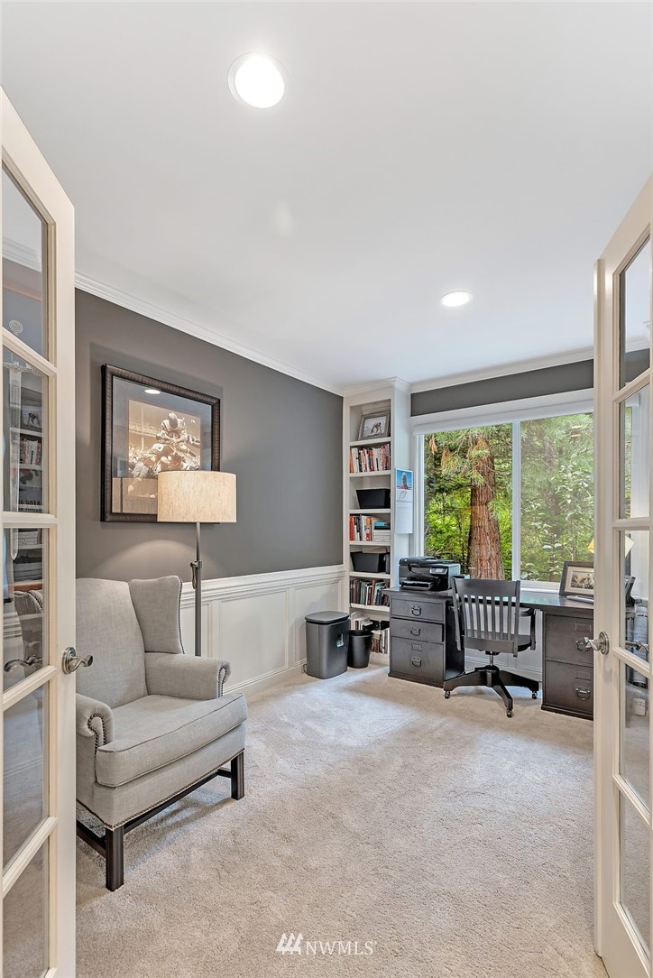 5010 176th Street Southeast Bothell, WA 98012 - Photo 10 of 25 a living room with furniture and a large window