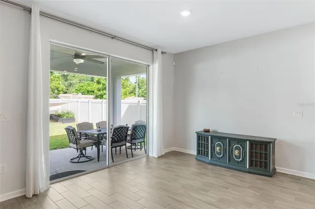 a kitchen with stainless steel appliances granite countertop a sink a stove and a microwave