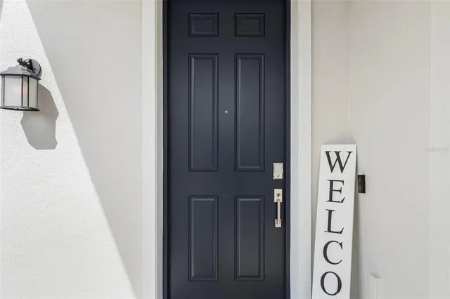a view of workspace with wooden floor windows