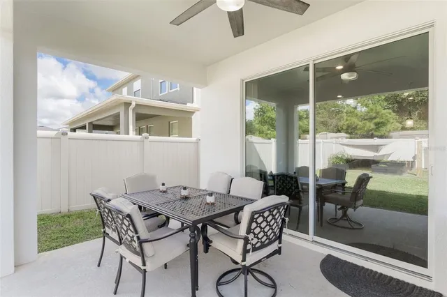 an aerial view of residential houses with outdoor space and river