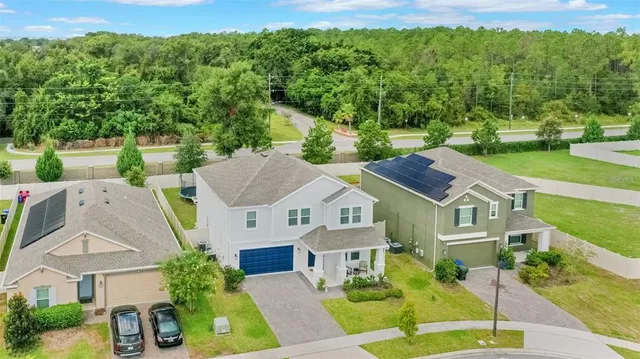 an aerial view of multiple house