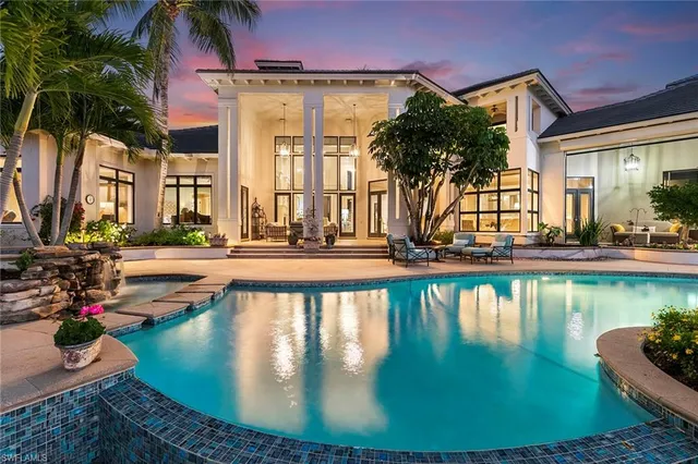 a view of a house with swimming pool