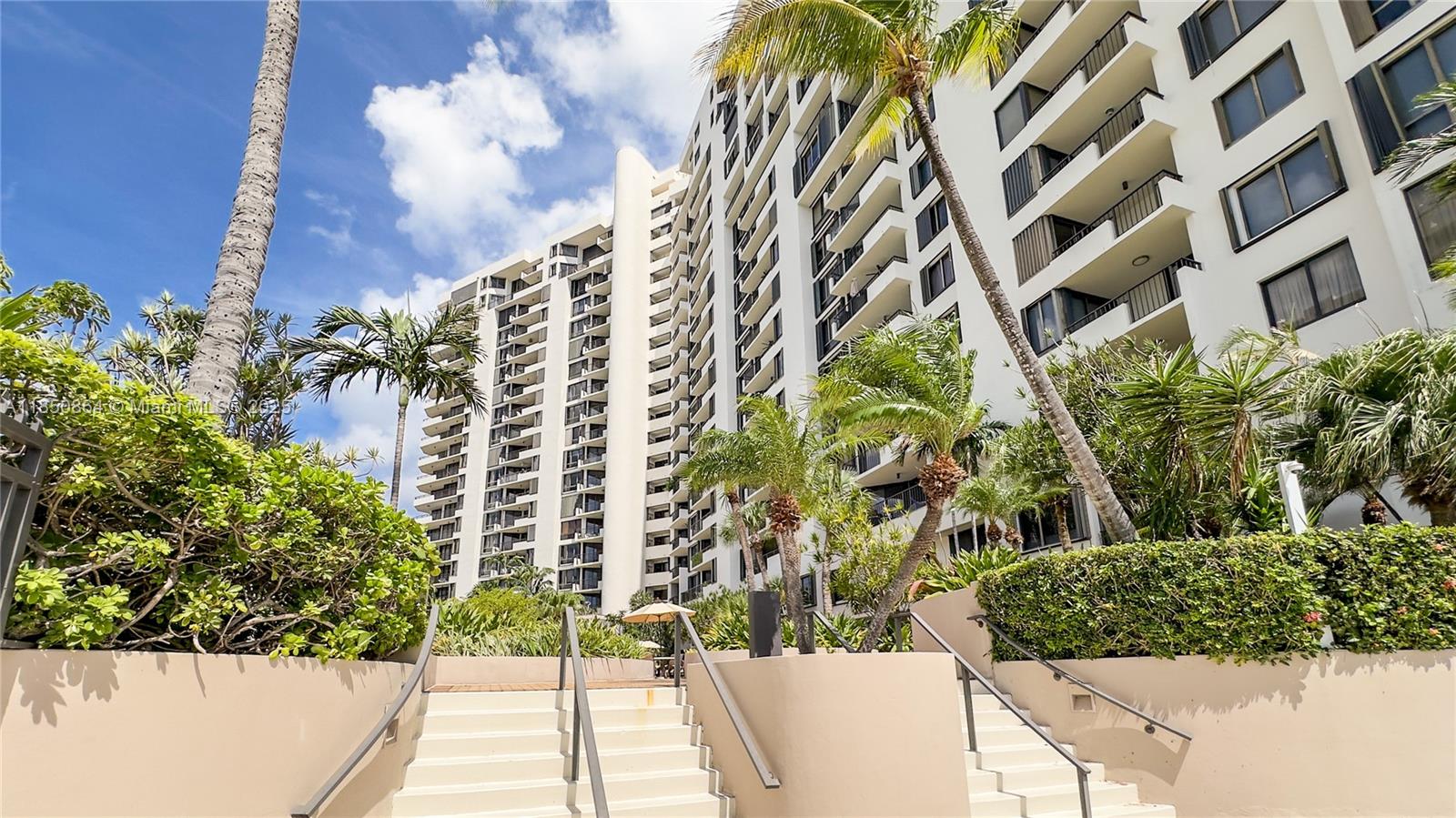520 Brickell Key Drive, Unit A1102 Miami, FL 33131 - Photo 29 of 33 a view of building with yard and staircase