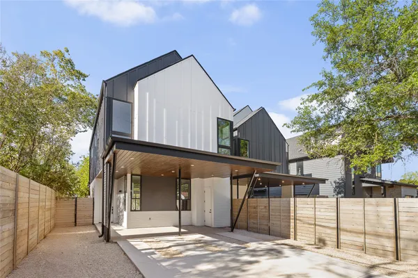 a front view of a house with a garage
