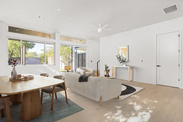 a living room with furniture and a table