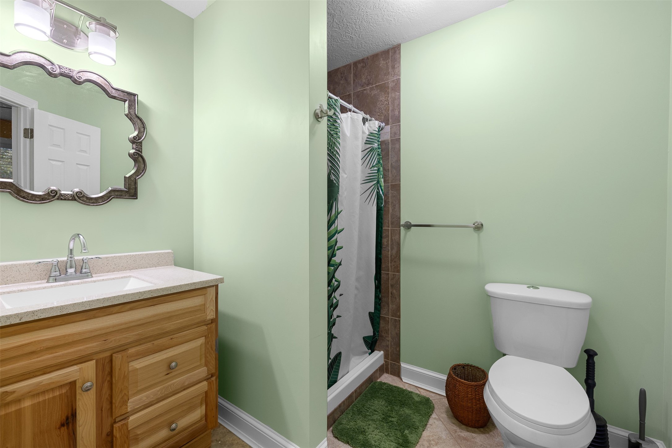 116 Lost Lane Bellville, TX 77418 - Photo 14 of 32 a bathroom with a sink a toilet and shower