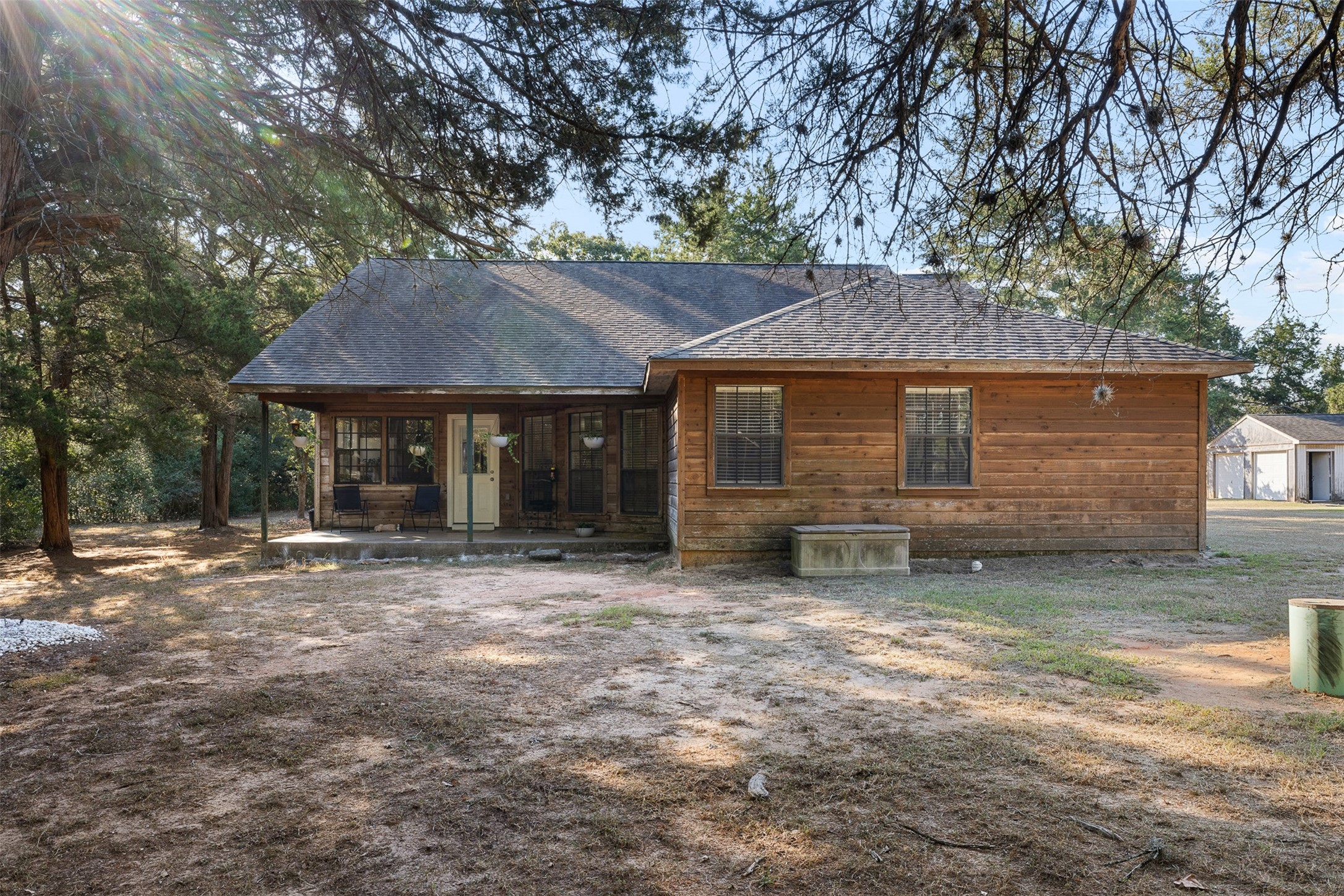 116 Lost Lane Bellville, TX 77418 - Photo 20 of 32 a front view of a house with a garden