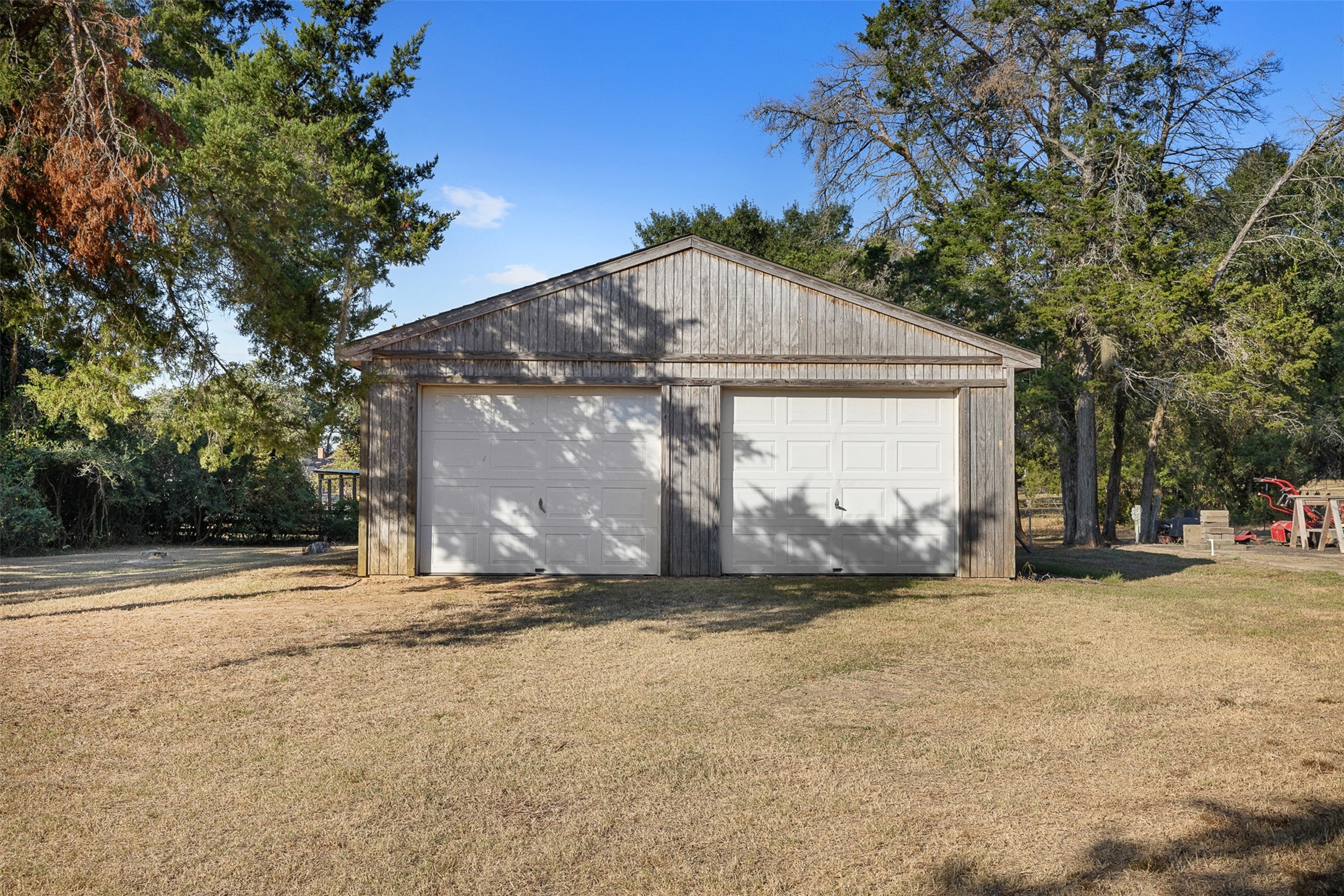 116 Lost Lane Bellville, TX 77418 - Photo 24 of 32 a view of a house with a yard