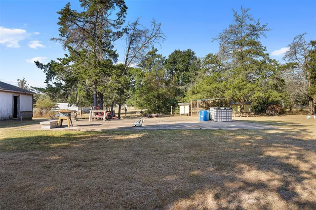 a view of house with outdoor space