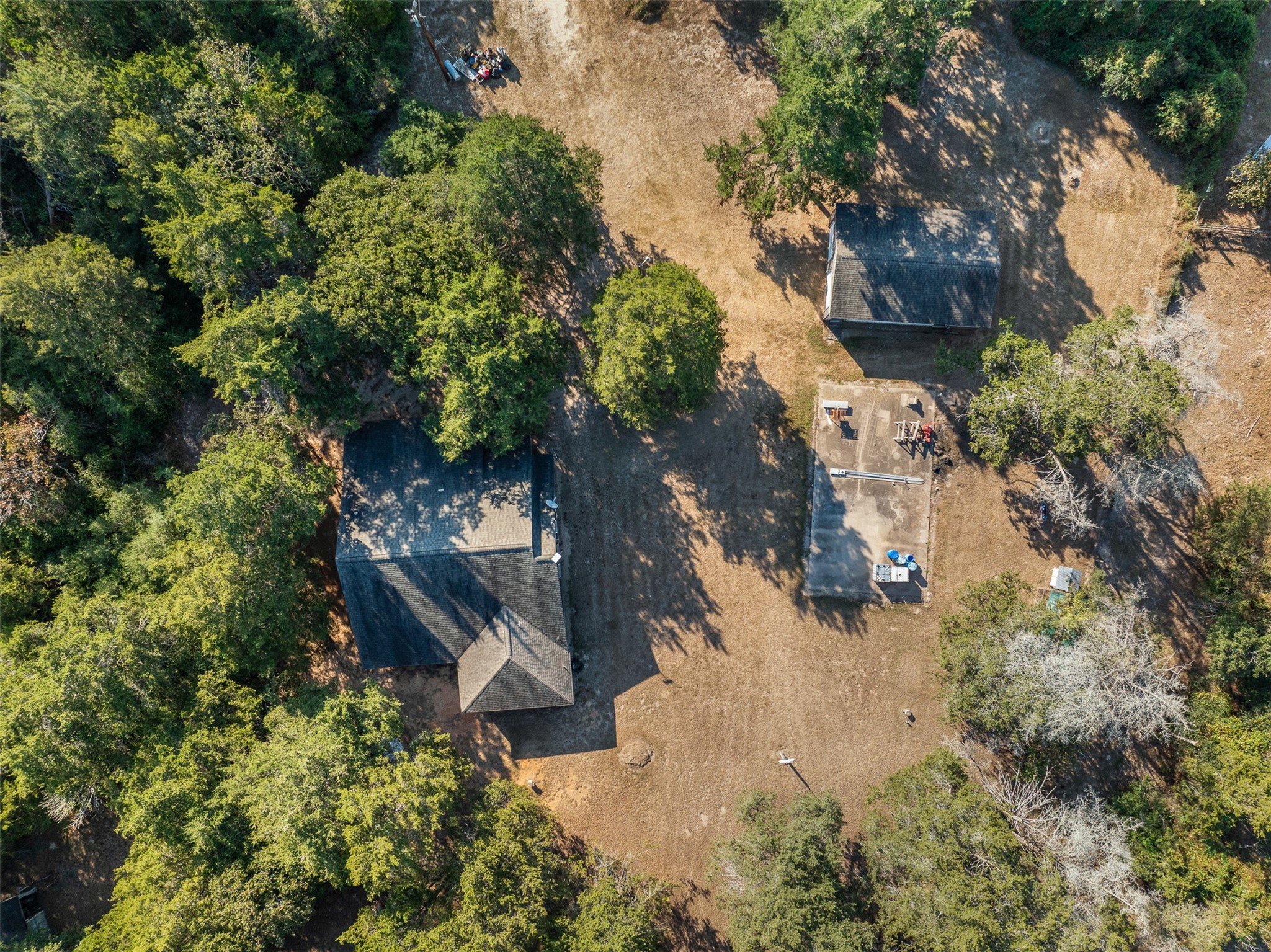 116 Lost Lane Bellville, TX 77418 - Photo 29 of 32 an aerial view of a house with a yard