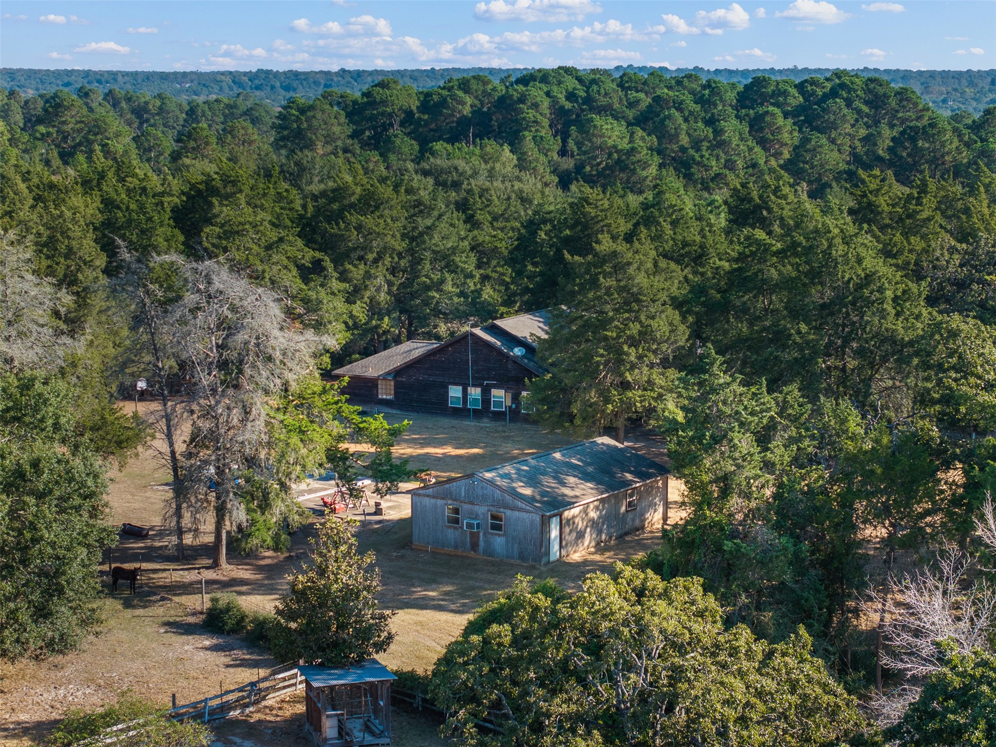 116 Lost Lane Bellville, TX 77418 - Photo 32 of 32 an aerial view of a house with a yard