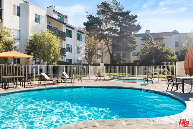 a view of a house with swimming pool