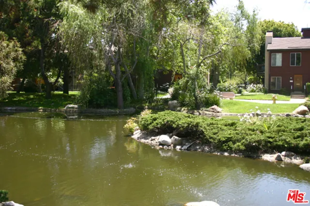 a view of lake with green space
