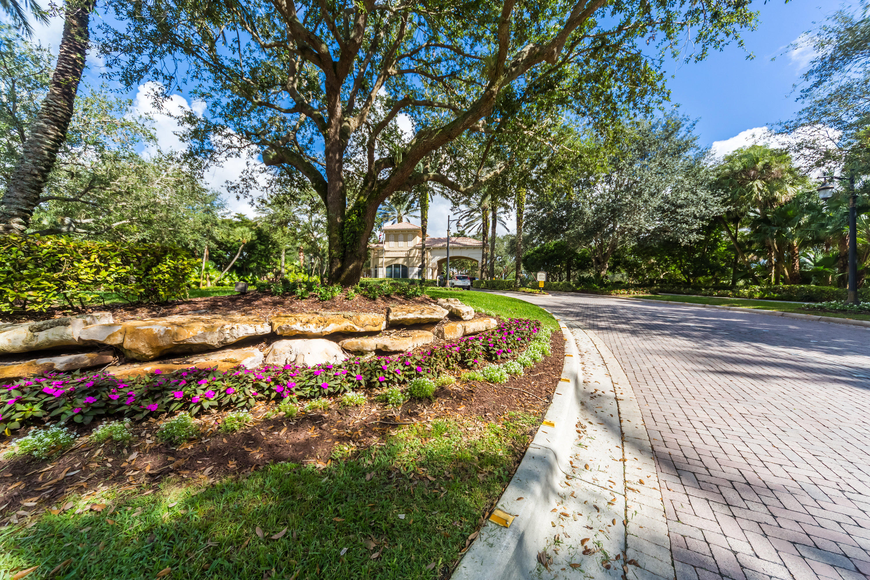 8077 Laurel Ridge Court Delray Beach, FL 33446 - Photo 33 of 34 CLUB ENRANCE