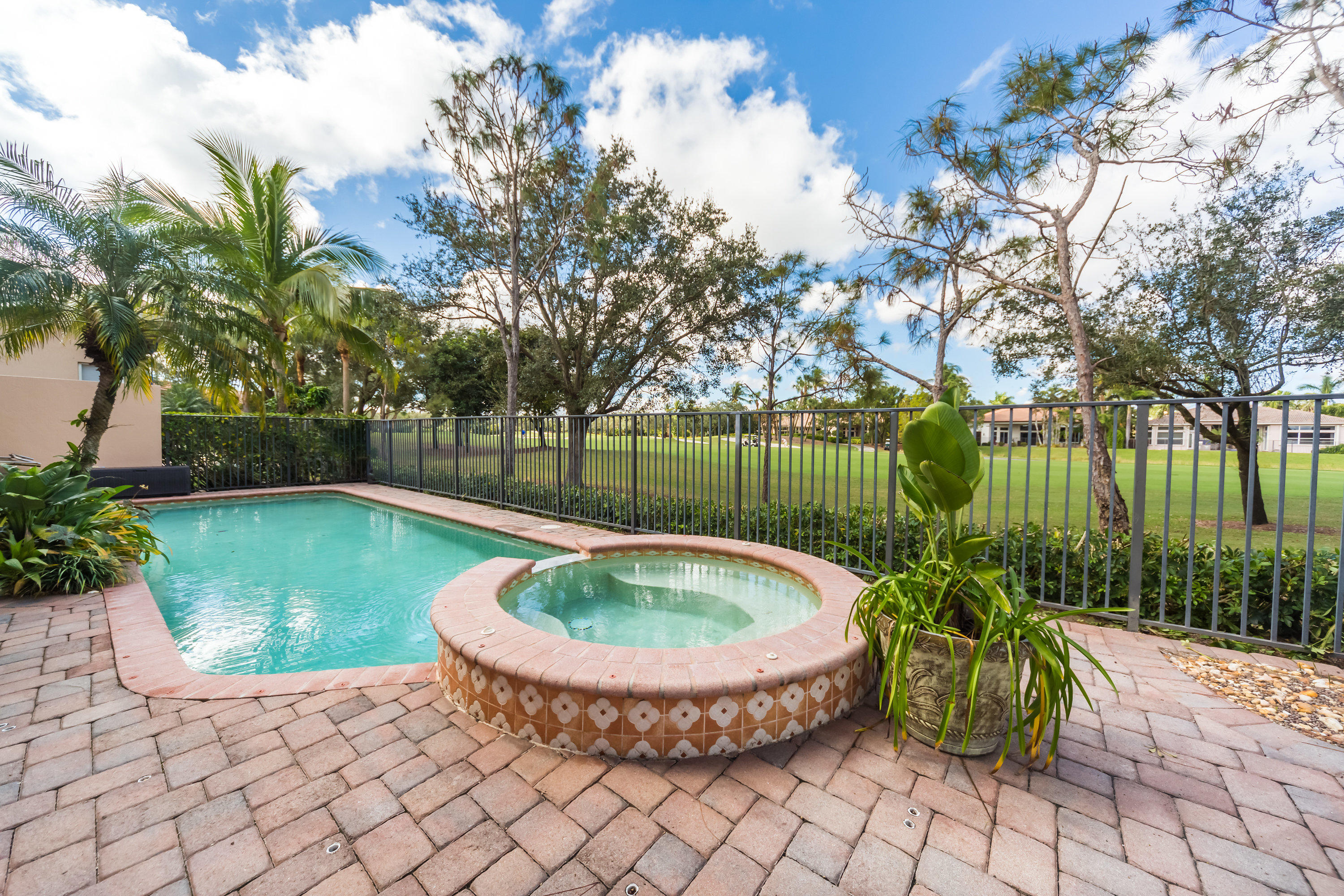 8077 Laurel Ridge Court Delray Beach, FL 33446 - Photo 9 of 34 HEATED POOL AND SPA