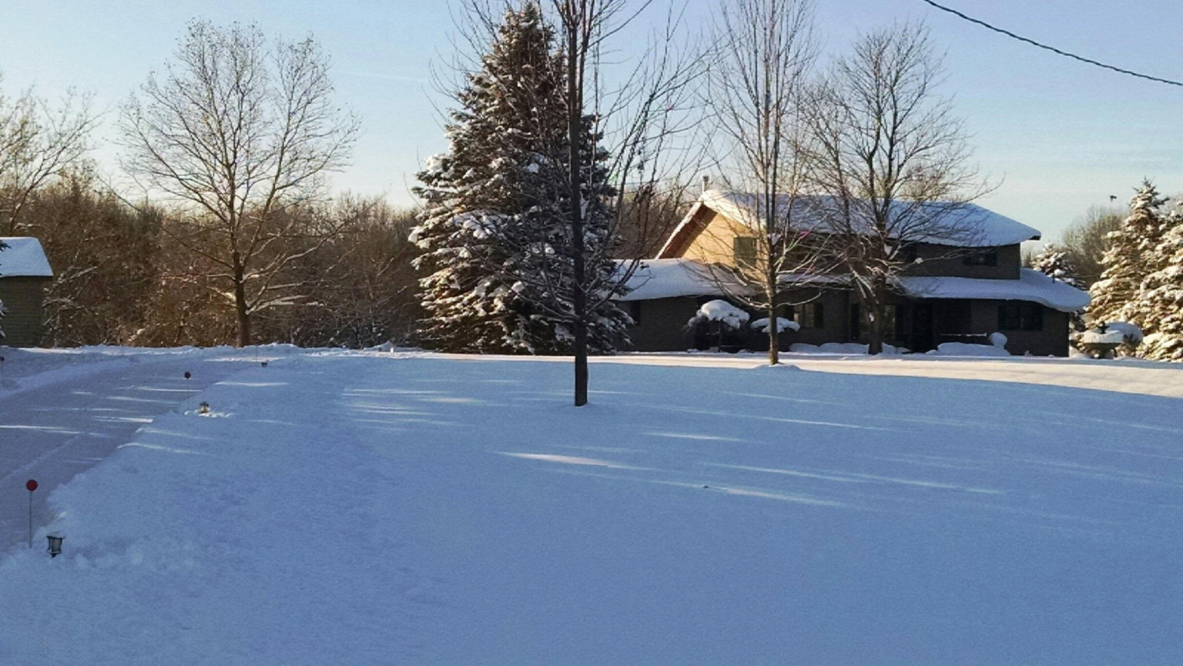 8300 2 Mile Road Northeast Ada, MI 49301 - Photo 1 of 17 FrontElevation