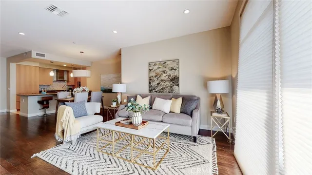 a living room with furniture and a rug