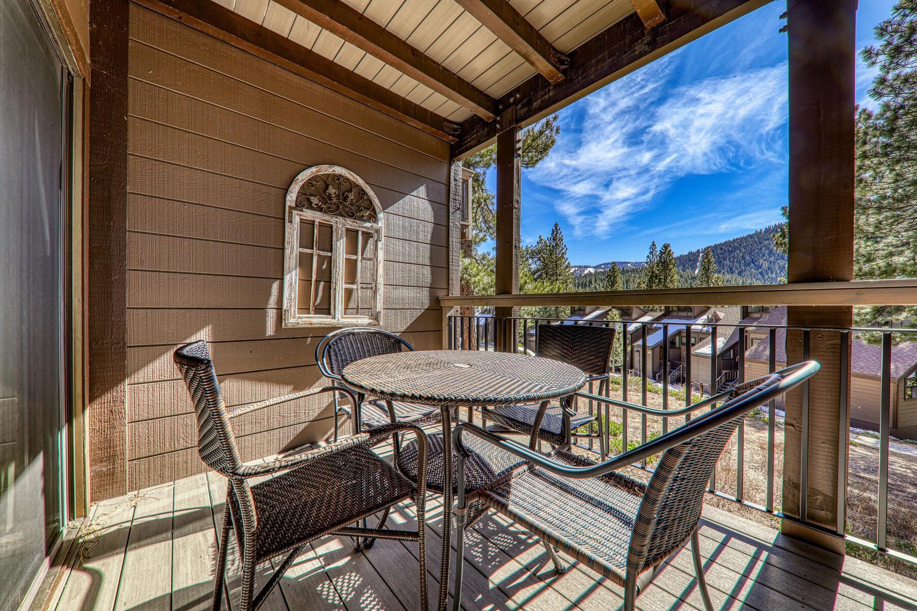 6092 Rocky Point Truckee, CA 96161 - Photo 15 of 27 a view of a balcony with chairs and wooden floor