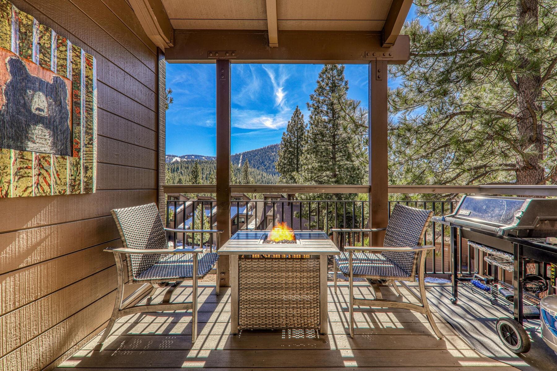 6092 Rocky Point Truckee, CA 96161 - Photo 3 of 27 a view of a balcony with wooden floor and outdoor seating