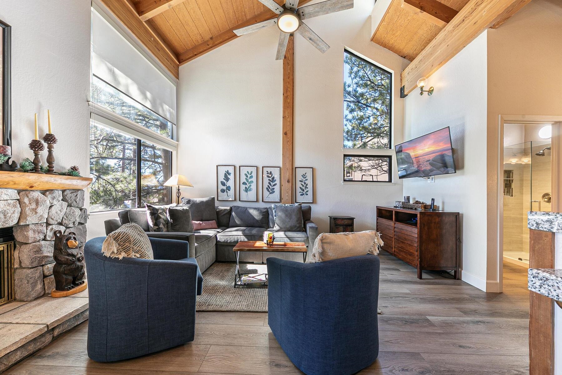 6092 Rocky Point Truckee, CA 96161 - Photo 4 of 27 a living room with fireplace furniture and a large window