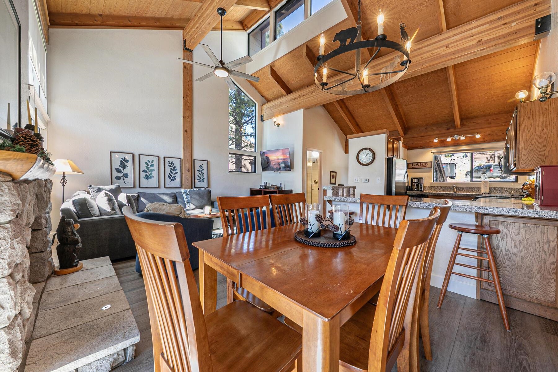 6092 Rocky Point Truckee, CA 96161 - Photo 7 of 27 a view of a dining room with furniture and wooden floor