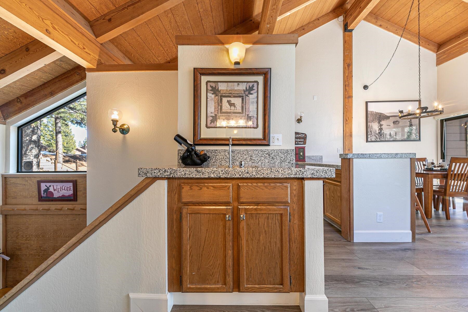 6092 Rocky Point Truckee, CA 96161 - Photo 10 of 27 a view of a hallway with wooden floor and staircase