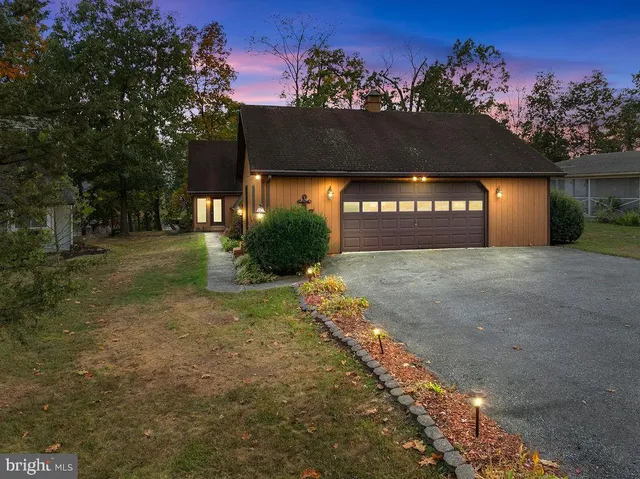 a view of a street with a building in the background