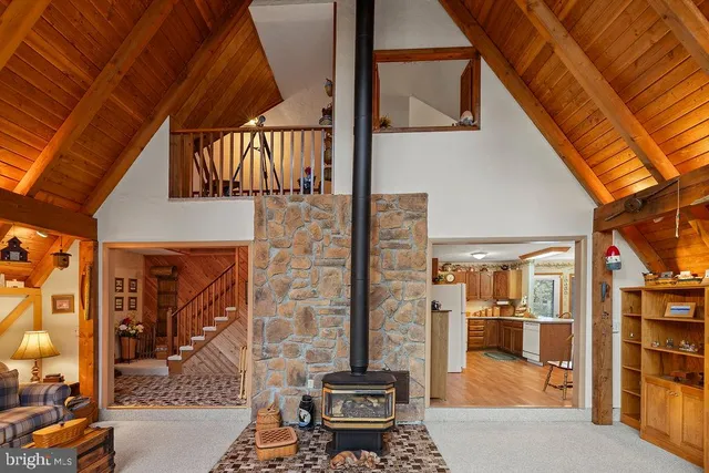 a view of a brick house with large windows