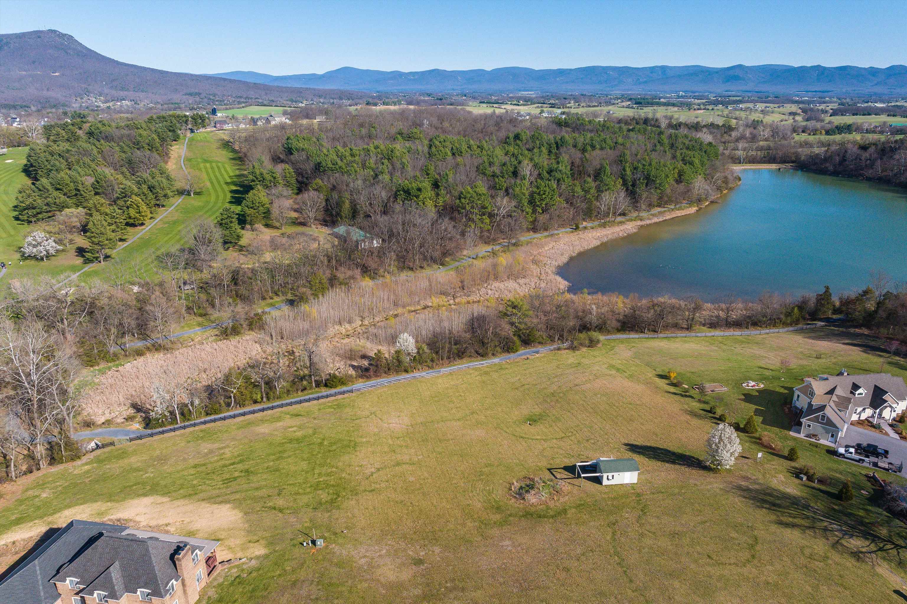1.74-ac Massanetta Springs Road Harrisonburg, VA 22801 - Photo 11 of 32 a view of a lake with mountains in the background