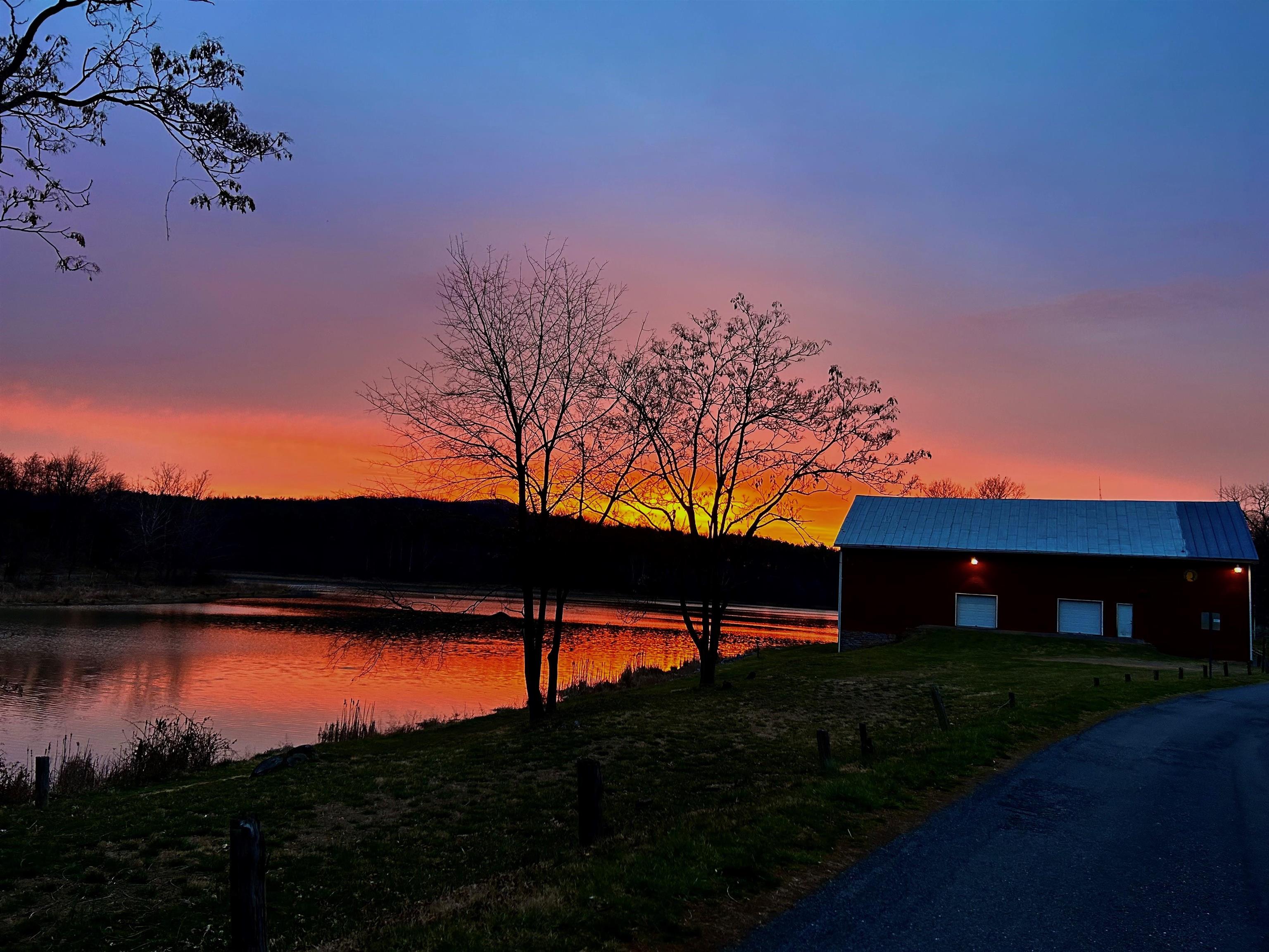 1.74-ac Massanetta Springs Road Harrisonburg, VA 22801 - Photo 29 of 32 a view of a lake and a yard