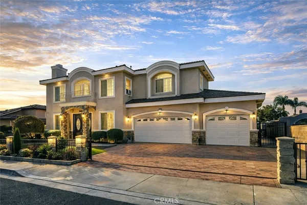 front view of a house with a street