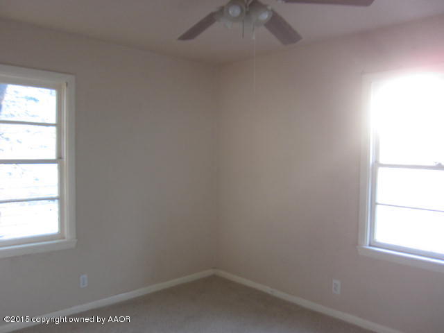 4321 Gables Street Amarillo, TX 79110 - Photo 11 of 13 an empty room with a window