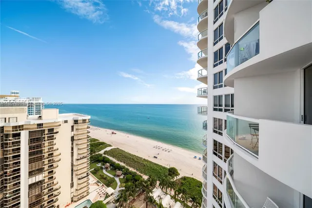 a view of roof with city view
