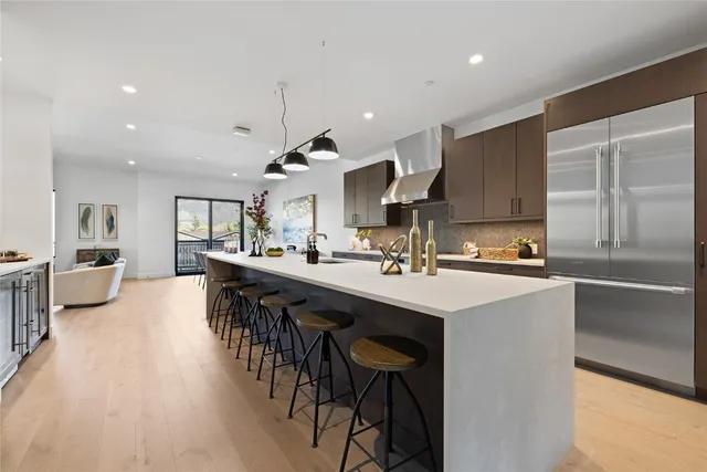 a bedroom with a bed and a fireplace