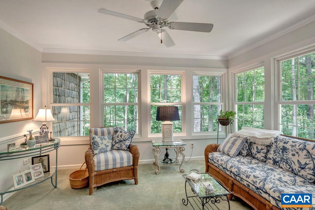 31 Out Of Bounds Road Palmyra, VA 22963 - Photo 15 of 41 a living room with furniture and large windows