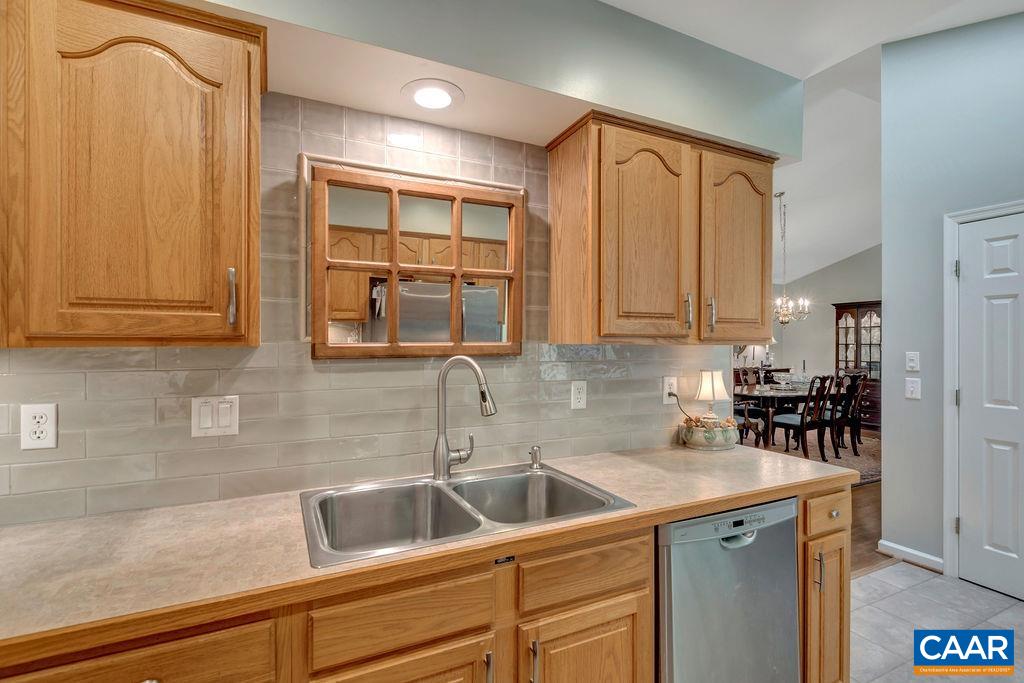 31 Out Of Bounds Road Palmyra, VA 22963 - Photo 8 of 41 a kitchen with stainless steel appliances granite countertop a sink a stove and cabinets