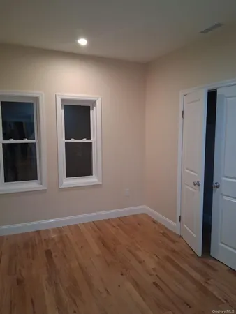 a view of a livingroom with wooden floor