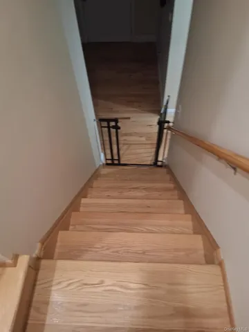 view of an empty room with windows and closet