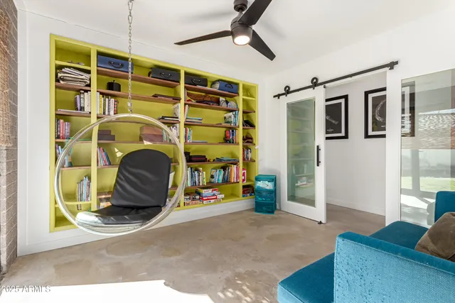 a kitchen with a sink a stove top oven a refrigerator and a cabinets