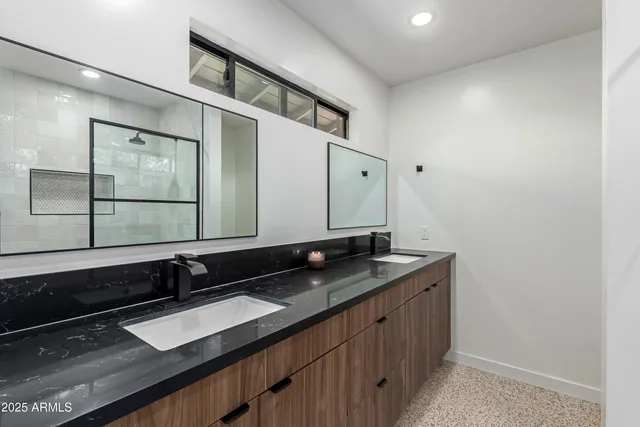 a bedroom with a bed and a cabinets