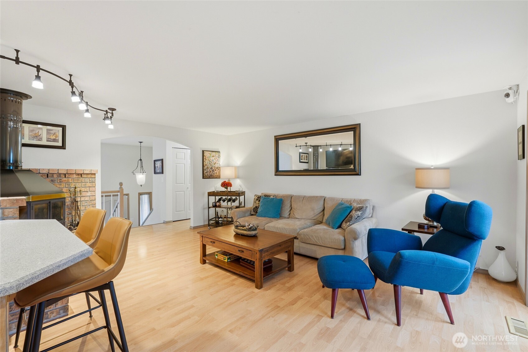 15003 104th Avenue Northeast Bothell, WA 98011 - Photo 12 of 40 a living room with furniture and wooden floor